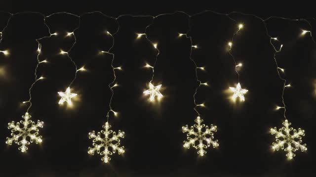 Электрогирлянда "Занавес со снежинками и звездами"