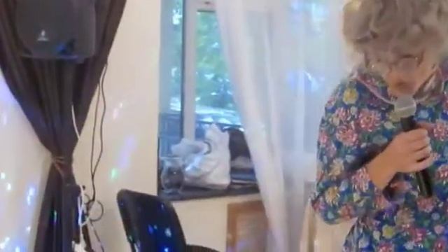 Я в образе Бабы Клавы, поздравляю молодоженов.