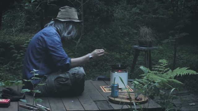 BRUCKE. The Staircase Railing and a Small Wood Stove