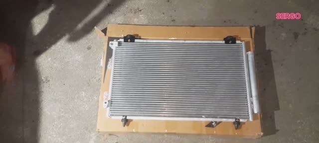 Замена радиатора кондиционера Джили Эмгранд ЕС7