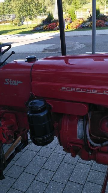 Припаркованный в городе Порш