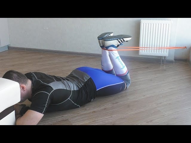 Сгибание ног лёжа с резиной: техника и нюансы